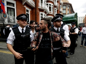 Assange sees end to standoff within year